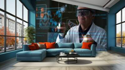 Scientist is using futuristic innovative technology vr mask with augmented reality holograms for his research in laboratory.Concept of future,innovation,immersive technology,science,research,medicine Wall mural