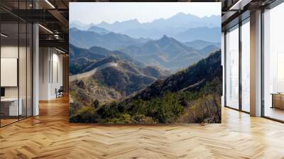 A breathtaking view of the Great Wall of China, winding over picturesque mountains and showcasing a serene blend of nature and history. Wall mural