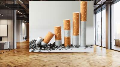 A creative arrangement of cigarettes illustrating a gradual decline, symbolizing smoking cessation and health awareness. Wall mural