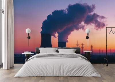 A stunning sunset view of cooling towers emitting steam, showcasing industrial energy production against a colorful sky. Wall mural