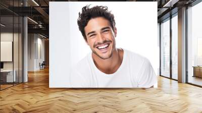 Portrait of a handsome young man smiling while standing against white background Wall mural