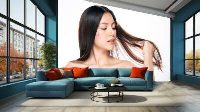 beautiful asian women are holding hair Wall mural