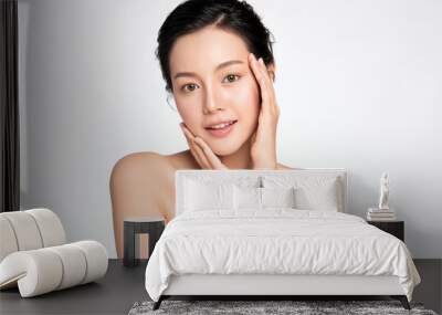 Beautiful Young asian Woman touching her clean face with fresh Healthy Skin, isolated on white background, Beauty Cosmetics and Facial treatment Concept Wall mural