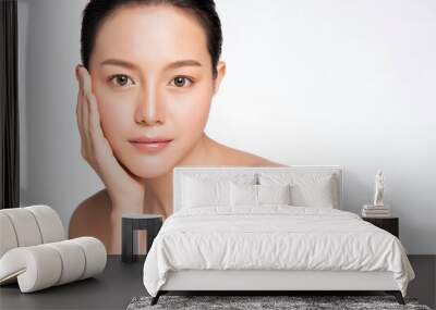 Beautiful Young asian Woman touching her clean face with fresh Healthy Skin, isolated on white background, Beauty Cosmetics and Facial treatment Concept Wall mural