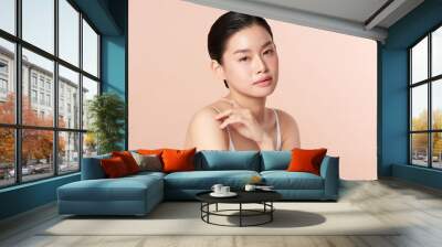 Beautiful young asian woman with clean fresh skin on beige background, Face care, Facial treatment, Cosmetology, beauty and spa, Asian women portrait Wall mural