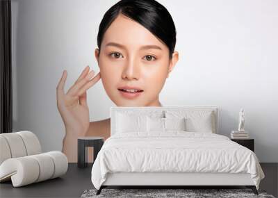 close up Beautiful Young asian Woman touching her clean face with fresh Healthy Skin, isolated on white background, Beauty Cosmetics and Facial treatment Concept Wall mural