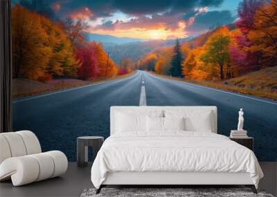 Asphalt road landscape at sunset in beautiful Autumn landscape Wall mural