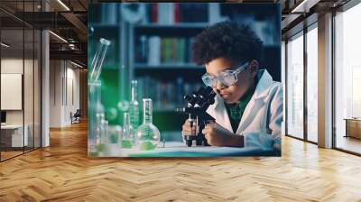 A little boy who dreams of being a scientist is doing a science experiment. Wall mural