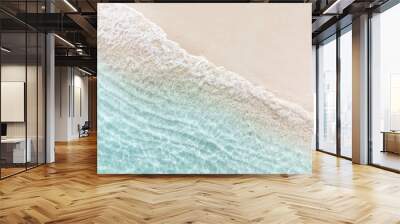 Aerial top view of beautiful tropical white sand beach with wave foam and transparent sea, Summer vacation and Travel background with copy space, Top view from drone Wall mural