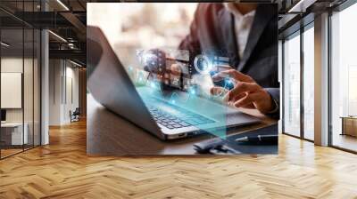 Businessman using laptop computer with a visual screen global network connection Graph analyzing financial growth and investment data planning Wall mural