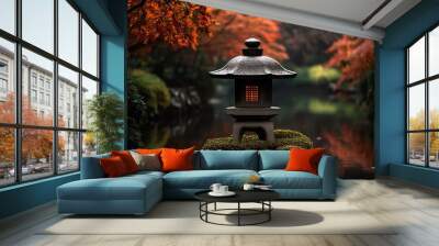 A lone stone lantern glows with warm light surrounded by lush greenery reflected in a still pond under a canopy of autumn leaves Wall mural