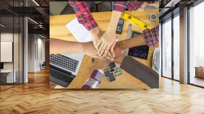 Engineer or architect people coordinate hands in office. Concept Teamwork. Wall mural