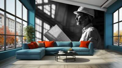 Engineer with helmet, reviewing plans, harsh noon light, high contrast, side view, feeling of isolation Wall mural