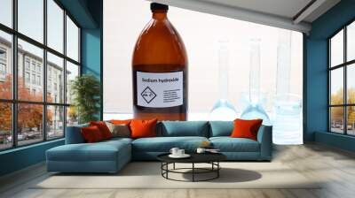 Sodium hydroxide in bottle, chemical in the laboratory Wall mural