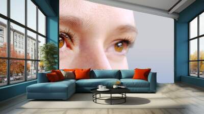 close up part of the woman's face, girl 20-29 years old, human eye looking to the side, the concept of surveillance, peeping, tracking, vision examination, cosmetic procedures Wall mural