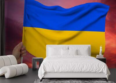 photo of the beautiful colored national flag of the modern state of Ukraine on textured fabric, concept of tourism, emigration, economics and politics, closeup Wall mural