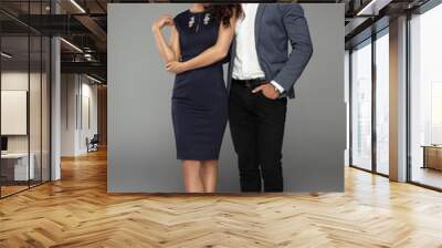 Beautiful couple on grey background Wall mural