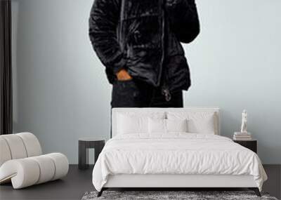 Handsome african american man in black jacket isolated on gray background Wall mural