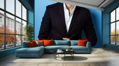 Handsome man wear black suit Wall mural