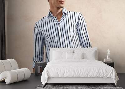 hansome man wear striped cotton shirt in black and white Wall mural