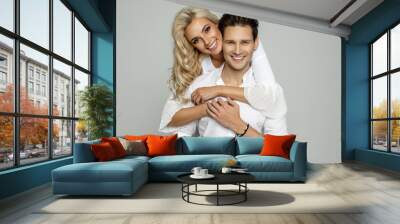 Portrait of beautiful cheerful couple Wall mural