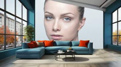 Portrait of beautiful young woman with clean and healthy face. N Wall mural