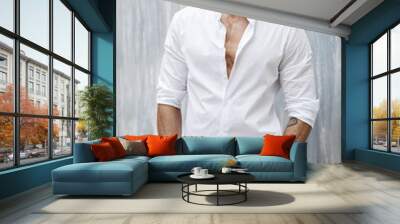 Portrait of handsome man in white shirt Wall mural