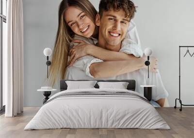 Portrait of smiling beautiful couple Wall mural