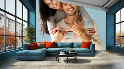 Portrait of smiling beautiful couple Wall mural