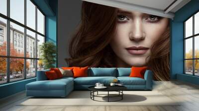 Portrait of young woman with dramatic look Wall mural