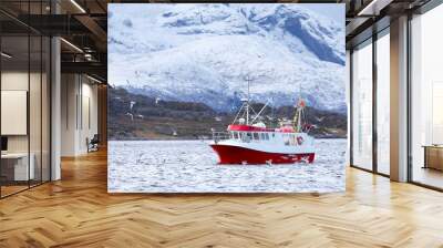 Fishing boat at sea in arctic environment Wall mural