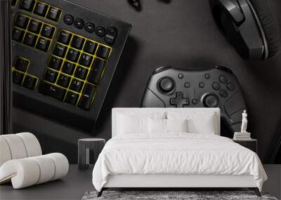 Keyboard and game controller amidst various wireless devices Wall mural