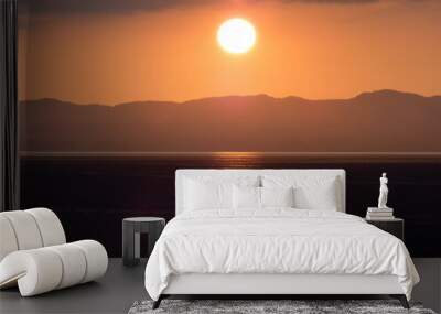 Sea lit by the setting sun 2 Wall mural