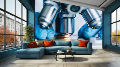 Close-up shot of microscope with metal lens at laboratory. Wall mural