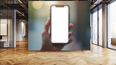 Hand Holding Smartphone with Blank Screen Wall mural