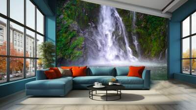 A stunning scene of nature with many waterfalls from the high mountain at Milford Sound, New Zealand. Wall mural