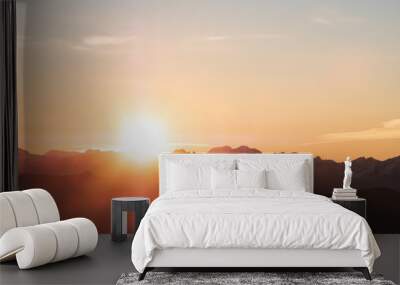 A stunning scene of sunset on the top of Alps mountain. Wall mural