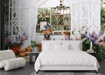 white retro terrace in the summer garden decorated with vintage details and bouquets of wildflowers lilac lupines with retro pots Wall mural