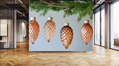 vintage inspired glass pine cone ornaments hanging on a christmas tree Wall mural