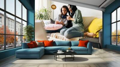 Single parenthood. Mother and daughter spending time together at home. Wall mural