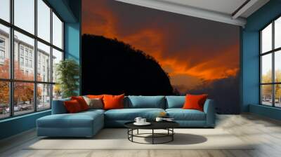 Sunset over small hill in Bohinj valley Wall mural