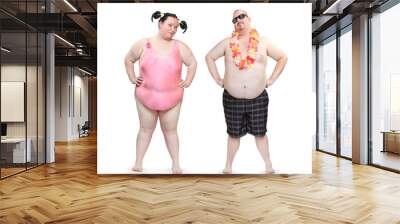 Obese couple in swimsuit with tropical flowers. Funny people enjoing holidays on the beach. Studio shot of two persons on white background. Wall mural