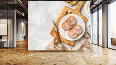 Bread with turkey ham in a white plate closeup. Toasts with sausage for breakfast on a bright table	 Wall mural