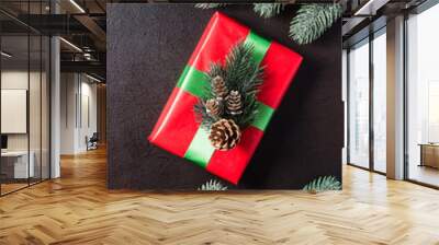 Christmas or New year holiday background with with gift and fir branches Wall mural