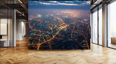 A luminous map of the vibrant city unfolds from above, capturing urban life's essence in a breathtaking view. Wall mural