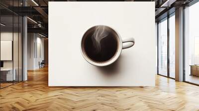 A steaming cup of black coffee on a white surface invites warmth and aroma in serene elegance. Wall mural