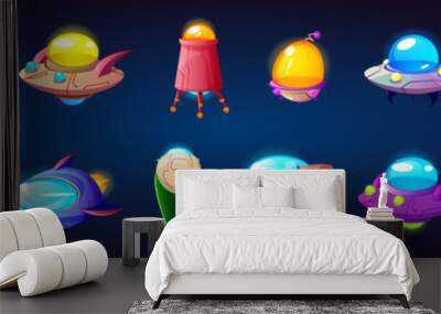 Alien spaceship game icons vector set. Funny rockets, ufo shuttles cartoon collection illustrations isolated on dark blue background. Fantasy cosmic objects, computer game graphic design elements Wall mural