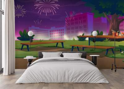 City park with wooden picnic table and firework display at night. Vector cartoon illustration of holiday celebration with summer landscape of public garden, town buildings and firecrackers Wall mural