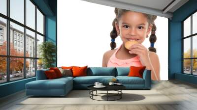 Cute small multiracial girl  eating a cookie - Isolated on white Wall mural