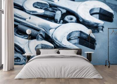 set of tools wrenches and bolts toned in blue with reflections Wall mural